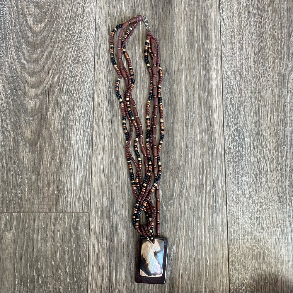 Long beaded brown necklace
